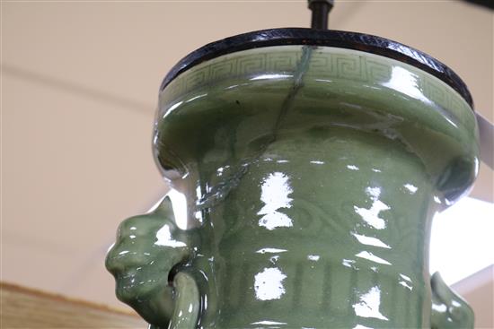 A Chinese celadon green glazed lamp